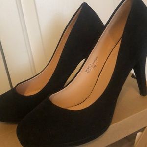 Black suede pumps